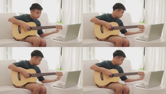 亚洲男孩在笔记本电脑上通过网络视频与老师在线学习音乐。高清在线视频素材下载