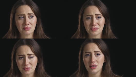 不快乐的年轻女子对着镜头哭泣高清在线视频素材下载