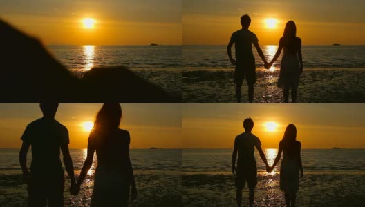 情侣剪影日落海滩高清在线视频素材下载