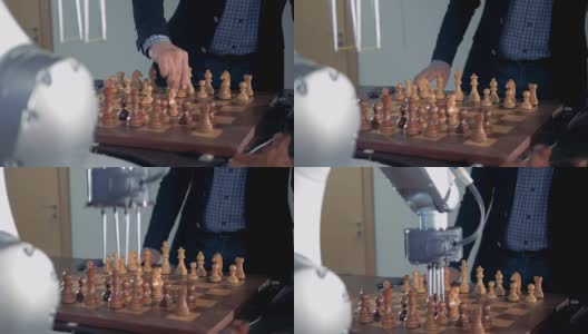 一个人和一个机器人下棋。高清在线视频素材下载