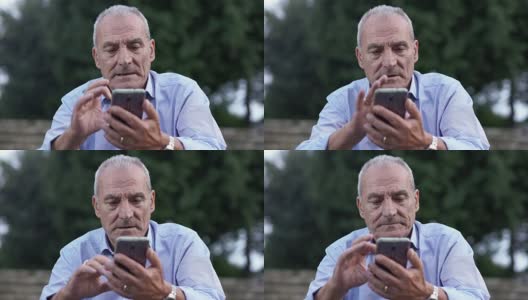 老人在用手机聊天高清在线视频素材下载