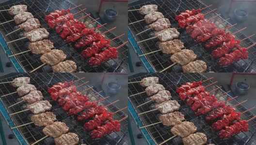 泰国街头小吃，沙嗲烤猪肉，烤肉串高清在线视频素材下载