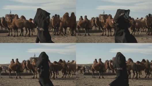 美女民族黑衣，阿拉伯长袍，草原骆驼，沙漠高清在线视频素材下载