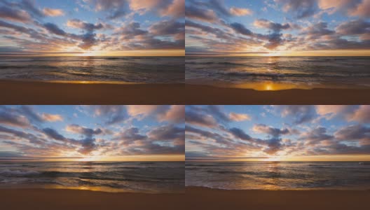 海洋海滩日出4k视频画面，海浪拍打着海沙高清在线视频素材下载