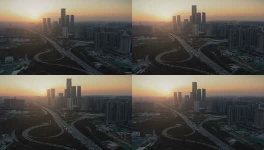 日落时城市交通的鸟瞰图高清在线视频素材下载