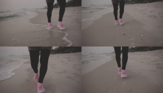 在海滩上跑步的成熟亚洲女人高清在线视频素材下载
