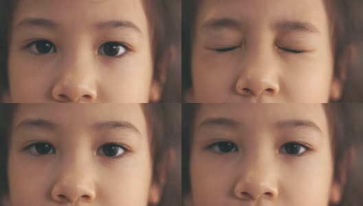 近4k的脸显示美丽的眼睛和眉毛可爱的亚洲女孩正在看着相机。它展示了人类皮肤的自然细节和文化多样性的迷人的面部表情。高清在线视频素材下载