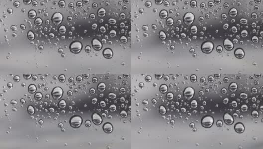 雨滴滴在窗玻璃上高清在线视频素材下载