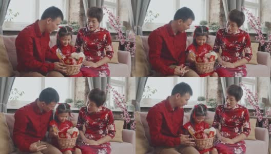 中国三口之家庆祝农历新年高清在线视频素材下载