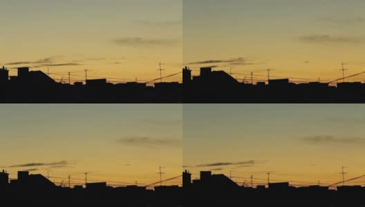 日落时建筑物剪影的延时拍摄高清在线视频素材下载