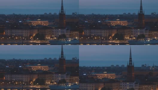 斯德哥尔摩,瑞典。Riddarholm Kyrka建筑或Riddarholm教堂的夜景，在Riddarholmen岛上埋葬瑞典君主的地方。夜晚城市的天际线高清在线视频素材下载