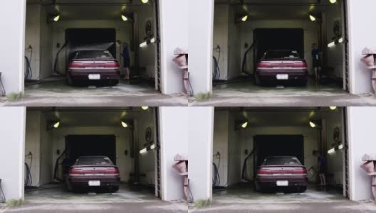 一个成年人在洗车高清在线视频素材下载