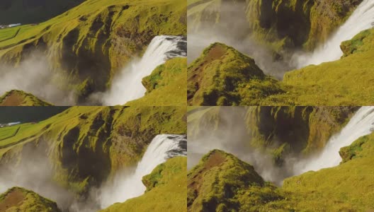 冰岛瀑布Skogafoss，在晴朗的夏日从顶部观景台观看高清在线视频素材下载