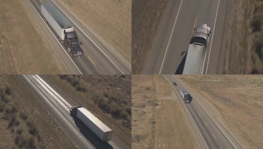 航拍:半卡车集装箱拖车穿越犹他州的荒芜乡村高清在线视频素材下载