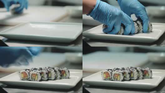 在寿司吧，戴着手套的寿司师傅把寿司卷放在装饰好的盘子里。高清在线视频素材下载