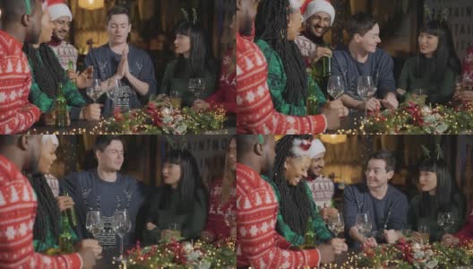 (中摄)一个醉汉和他的朋友们在酒吧庆祝圣诞节高清在线视频素材下载