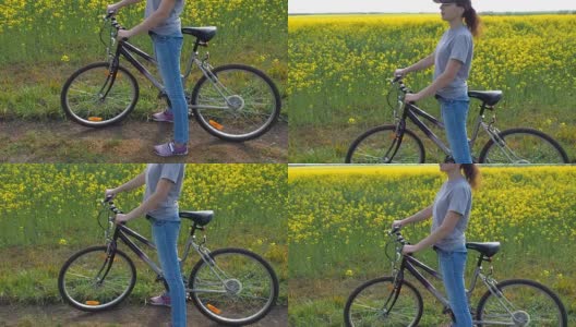 女孩骑着自行车在大自然中高清在线视频素材下载