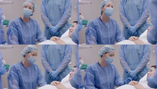 一名白人医生和她的手术团队为孕妇做手术高清在线视频素材下载