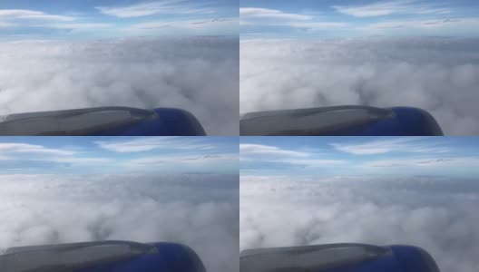 Amazing view of the blue sky from the plane flying over the clouds in MP4 HD format高清在线视频素材下载