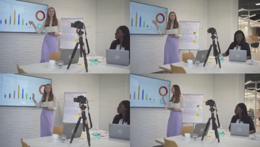 一位年轻成功的女商人正在参加一个关于如何创业的在线讲座。高清在线视频素材下载