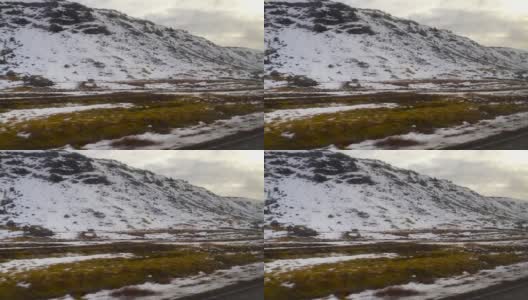 驾车穿越冰冻的冰岛高清在线视频素材下载