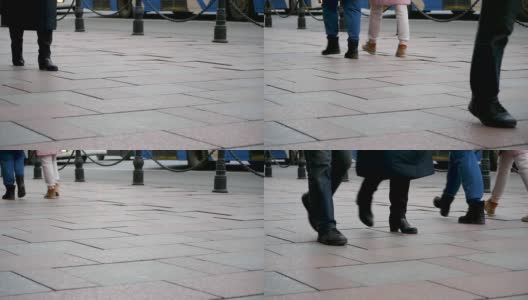 人们的脚走在城市的街道上。慢动作高清在线视频素材下载