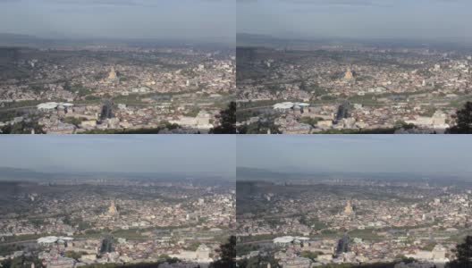从第比利斯的Mtatsminda公园高处俯瞰，三一大教堂Sameba司法之家高清在线视频素材下载