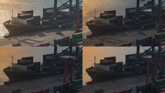 延时:货柜装卸至货轮运费在香港青衣港海运货柜港日出高清在线视频素材下载