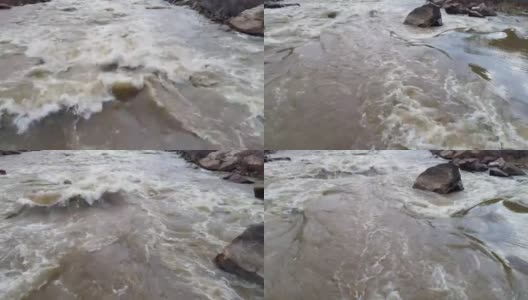 在科罗拉多河的急流上游低空飞行高清在线视频素材下载