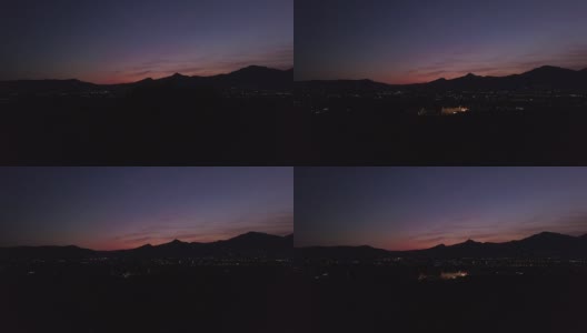 从上面的视频。意大利山脉背后令人难以置信的日落鸟瞰图。高清在线视频素材下载