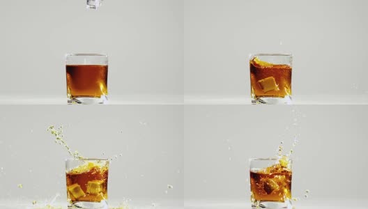 两块冰块掉进波旁威士忌酒杯里。慢动作高清在线视频素材下载