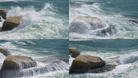 大海和岩石相遇，溅起巨大的水花高清在线视频素材下载