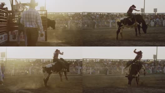 慢动作拍摄的一个男性公牛骑手在一个公牛骑比赛在一个体育场充满人在日落高清在线视频素材下载