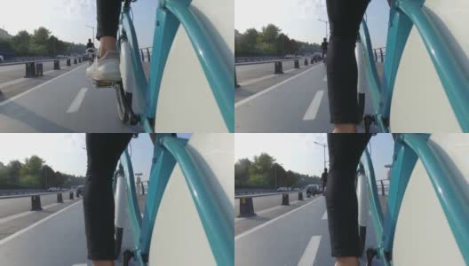 人们在海边的自行车道上骑车高清在线视频素材下载