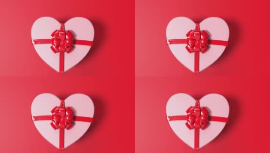12月31日是一个心形的白色礼品盒，用红丝带绑在红色循环准备文件在4K分辨率高清在线视频素材下载