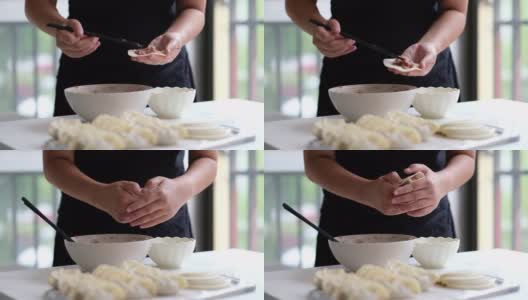 人们做中国饺子。中国新年的传统食物高清在线视频素材下载