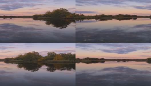 傍晚的江边，倒影着秋日的云朵高清在线视频素材下载