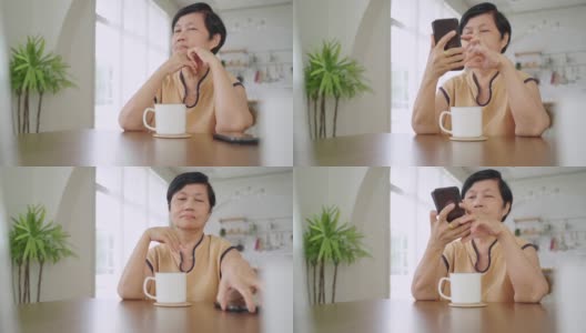 亚洲成熟女性使用智能手机高清在线视频素材下载