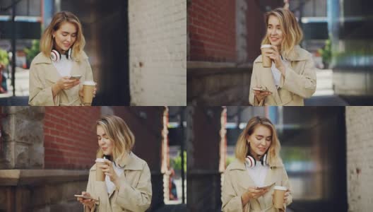 一个微笑的女孩站在现代城市的街道上，用智能手机喝着外卖咖啡。科技、饮品、青春理念。高清在线视频素材下载