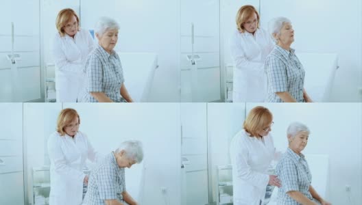 女医生在检查老年妇女高清在线视频素材下载