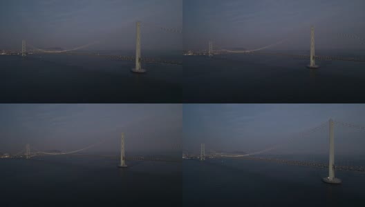 鸟瞰图-日落后明石海峡大桥全景缩小高清在线视频素材下载