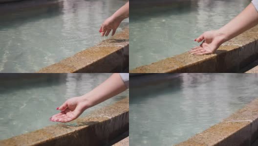 女人的手浸入水中-慢动作高清在线视频素材下载