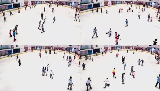 中国沈阳，2014年8月1日:在冰场滑冰的人们。沈阳,中国高清在线视频素材下载
