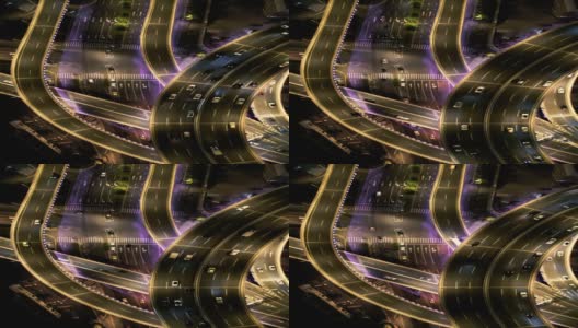 无人机视角的立交桥和城市交通在夜间高清在线视频素材下载
