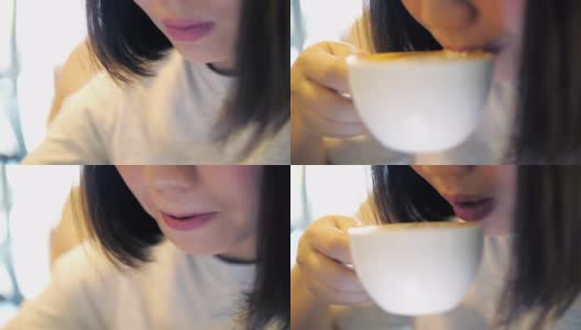 女人脸部特写喝咖啡，喝咖啡，慢镜头高清在线视频素材下载