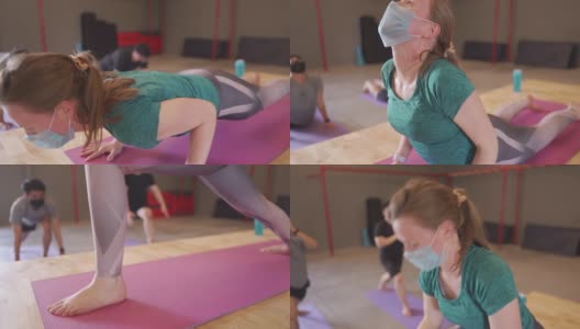 带着口罩在健身房练瑜伽，新常态高清在线视频素材下载