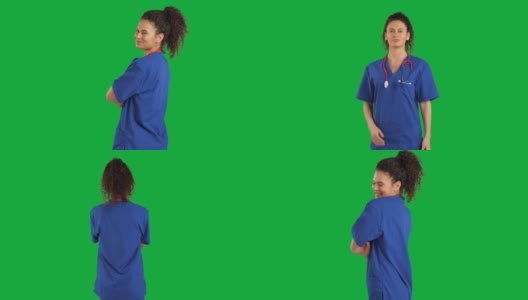 可爱的女医生看着镜头上的色度键绿色屏幕背景，情绪积极高清在线视频素材下载