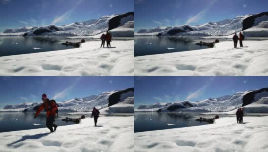 旅行者在南极洲的雪山中徒步旅行高清在线视频素材下载