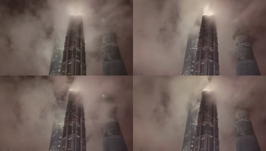 抬头望着雾蒙蒙的摩天大楼高清在线视频素材下载