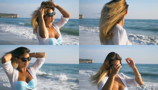 一名年轻女子在阳光明媚的海滩上散步和旋转。漂亮的女孩戴着太阳镜，抚摸着她的金发，享受着暑假。暑假或假期的概念。特写慢动作高清在线视频素材下载